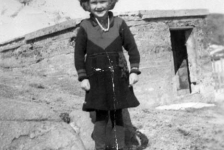 302: "I am 7 there, but I am 11 now". Mary Reddy wearing a dress knit by her mother. The cellar door  is Frank Ryan's. (circa 1945) [courtesy of Mary (Reddy) King]  - daughter of Michael Reddy &amp;amp; Elizabeth Moore